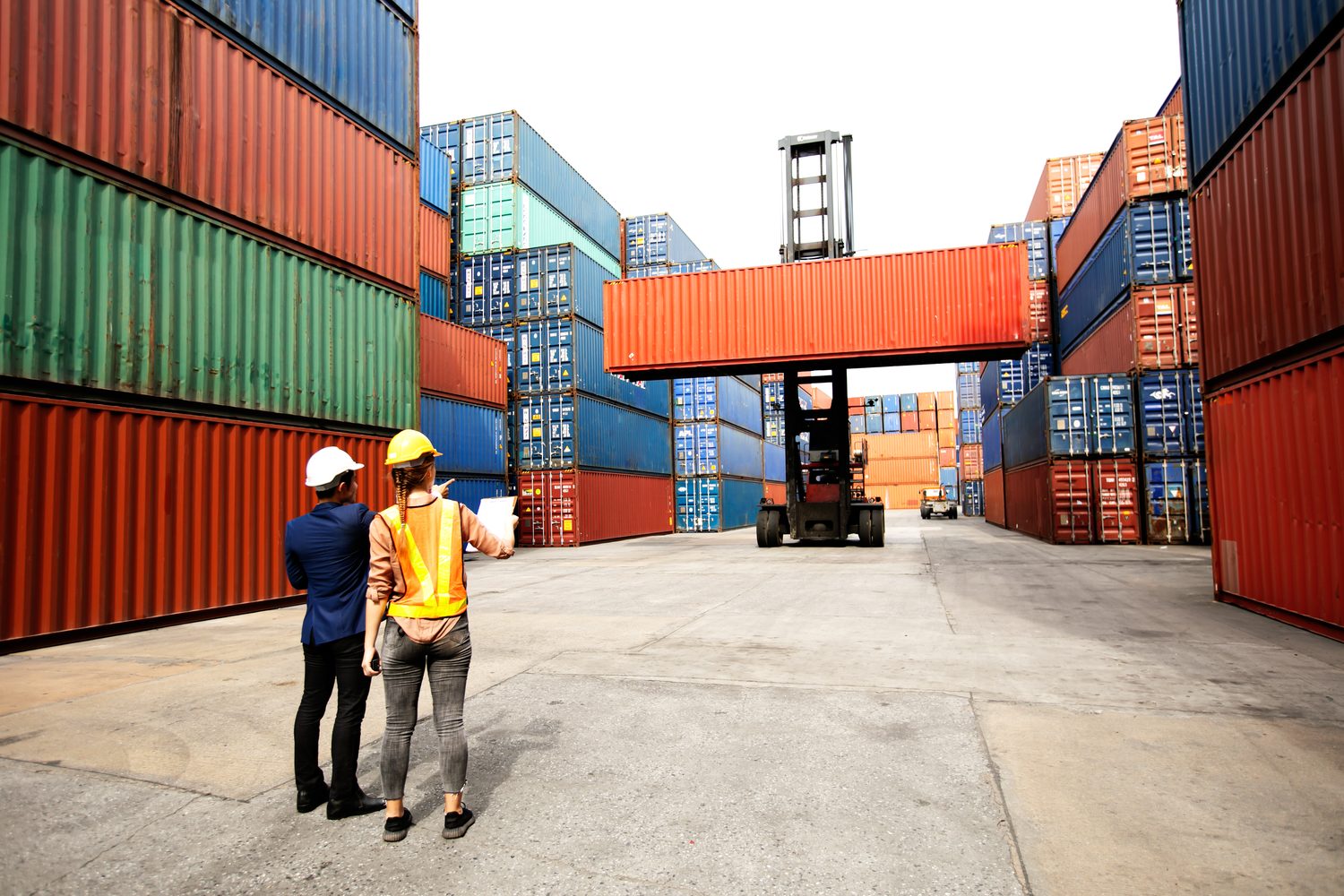 Maritime operations team overseeing a container terminal, representing crew and workforce management.
